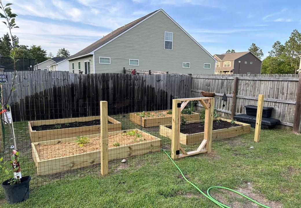 Custom garden beds and fence build by MAXXPRO