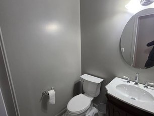 Freshly painted bathroom renovation by MAXXPRO